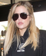 Pregnant Khloé Kardashian Carries the World's Most Expensive Purse at the Airport