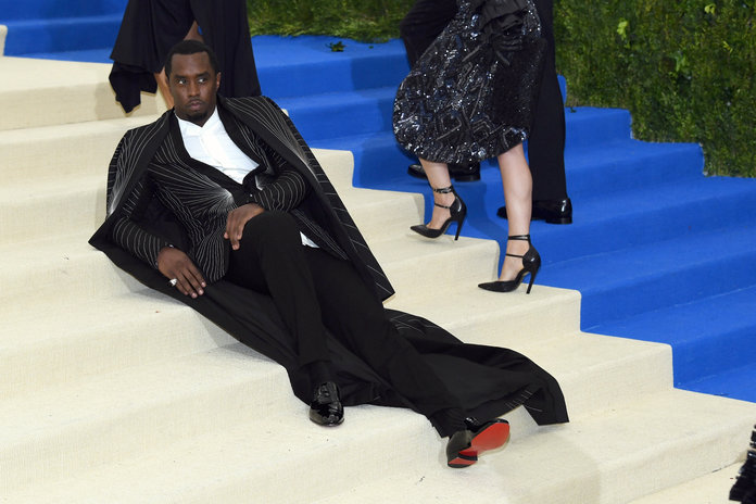 Why Is P. Diddy Lounging on the Steps of The Met Gala?
