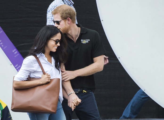 Meghan Markle and Prince Harry Hold Hands in Public, Look Completely Smitten